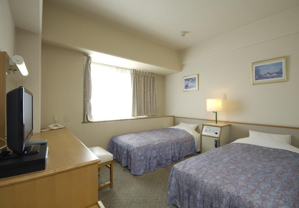 Okayama Business Hotel Annex Værelse billede